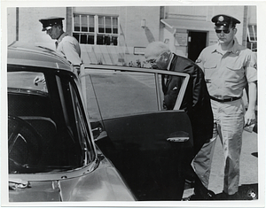 Mark Bortman entering a car