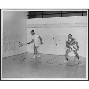 Two men in a game of squash