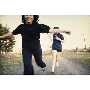 Women jogging on an outdoor track