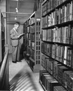 Wyllis Wright in the Stetson Library stacks