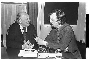 A.L. Lloyd, English folksinger and song collector (deceased). Being interviewed by BBC radio by Paddy O'Flaherty