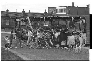 Burnt-out vehicles at Flying Horse Estate, Downpatrick after night of rioting on the anniversary of internment