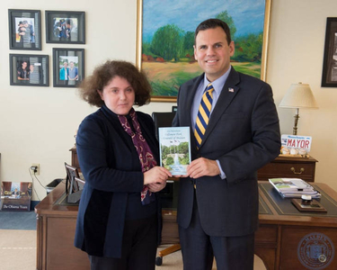 Inna Babitskaya presents her book Fellsmere Park 'Emerald of Malden' to Malden Mayor Gary Christenson