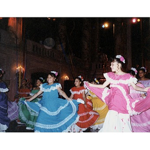 Girls in colorful costumes perform a folk dance at the Cultura Viva gala which celebrated Inquilinos Boricuas en Acción's 25th Anniversary.