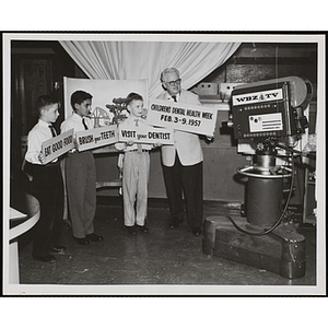 "William Wiles, John Cunley, and Richard Bramante (left to right) shown with Bob Emery at WBZ-TV on February 4, 1957"