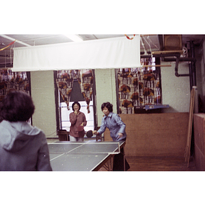 Players at Chinese Progressive Association International Women's Day ping-pong tournament