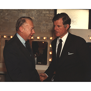 President Ryder and Senator Ted Kennedy shake hands