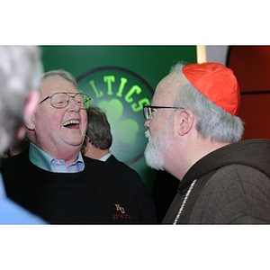 Neal Finnegan and Cardinal O'Malley laughing together