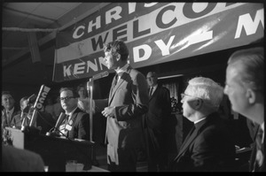 Robert F. Kennedy speaking at a dinner while stumping for Democratic candidates in the northern Midwest