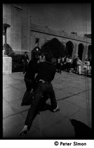 Street theater (part of a mock execution) in front of Marsh Chapel, Boston University