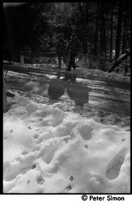 Verandah Porche (right) and Rico (Richard Wizansky) on a snowy road, Packer Corners commune