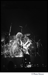 Jimmy Page playing a double-neck guitar in concert with Led Zeppelin at the Forum in Inglewood