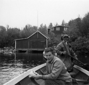 Joel M. Halpern in boat with Sami man