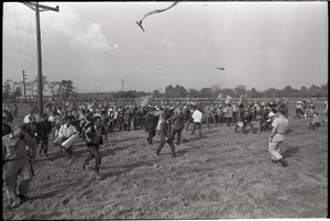 Antiwar demonstration at Fort Dix, N.J.: line of protesters holding pipe, advancing