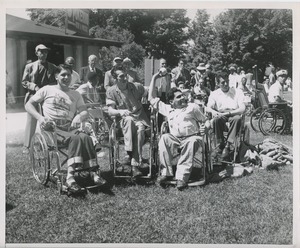 Men in wheelchairs playing ball