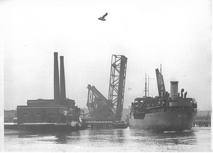 [View of the "Salem Maritime" ship passing through the Meridian Street Bridge]