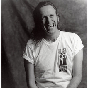 Abe Rybeck posing in an "Adult Children of Heterosexuals" t-shirt