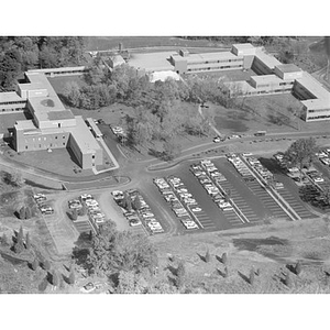 Suburban location of industrial buildings, some new construction, unidentified