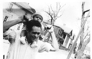 Fernando Loureiro carrying son, Antonio, on his shoulders