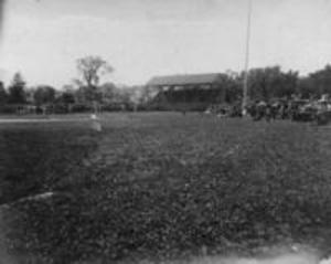 Fans watch a baseball game at Weston Field, 1897