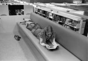Student studying in Sawyer Library