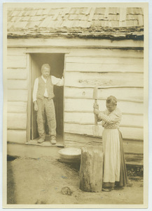 Black woman milling rice, Oakley, South Carolina