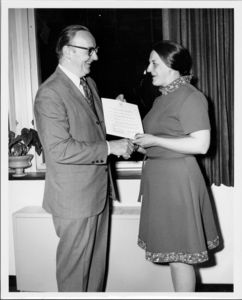 Suffolk University Professor Beatrice L. Snow (CAS Biology) with President Thomas A. Fulham (1970-1980) at an alumni awards event