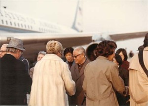 Congressman John Joseph Moakley, Evelyn Moakley, and others are greeted by Chinese officials at the airport during a congressional trip to China