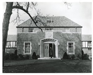 Cheverus Hall exterior: main entrance with student out front