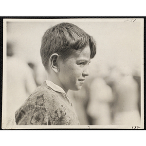 A boy from the Boys' Clubs of Boston, facing right