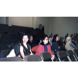 Chinese Progressive Association members sit and wait for a meeting to begin