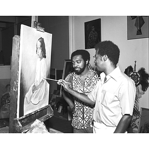African-American painter and observer in studio