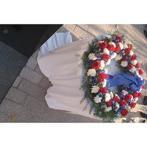 A wreath on a table at the Veterans Memorial dedication ceremony