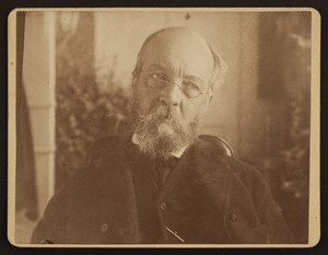 Head-and-shoulders portrait of Frederick Law Olmsted, Sr., seated, facing front, location unknown, ca. 1890