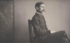 Oliver W. Holmes Jr., seated, facing right
