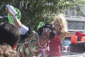 Parade marchers in wild costumes, with a cocktail shaker : Provincetown Carnival parade