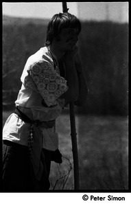 May Day at Packer Corners commune: Fritz Hewitt with painted face, leaning on a staff