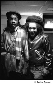 Peter Tosh (let) and unidentified man back stage before his appearance on Saturday Night Live