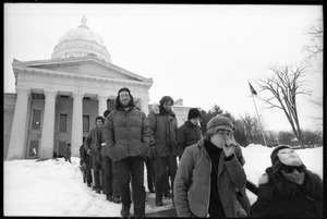 Protesters descending the steps at the Vermont State House during a demonstration against the invasion of Laos