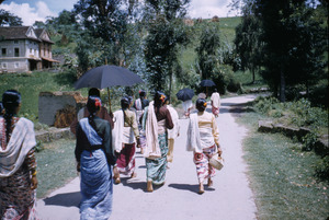 Women walking down road
