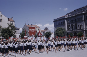 Schoolchildren saluting at national celebration