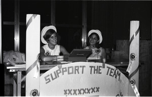 Ina Goldstein and Margie Greenfield sell Class Day buttons (Class of '70), Student Union