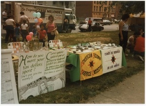 AFSC table at the North End Fair offering information opposing militarism and defense spending