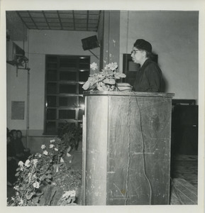 Shirley Graham Du Bois speaking at a podium