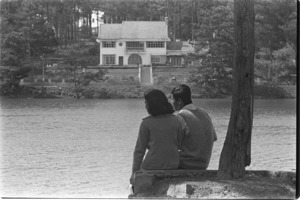 Vietnamese honeymooners and vacationing families near the lake; Tuyen Duc.