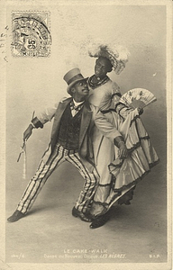 Jack Brown Poses in Drag Holding Skirt and Fan, with Dance Partner Charles Gregory