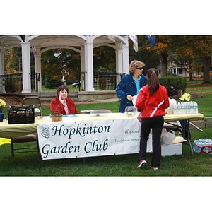 Hopkinton Garden Club sets up their table at their Marathon Daffodils project