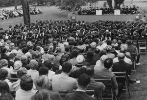 Seated audience and speakers: graduation ceremony, Wheaton College, 1964.