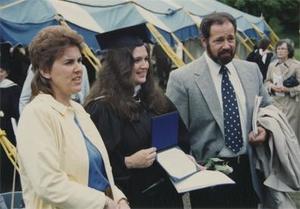 Graduate Displaying Diploma.