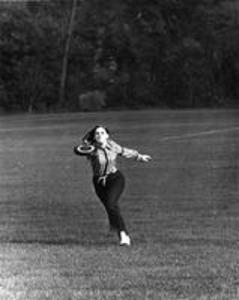 A female student catches a frisbee, 1969